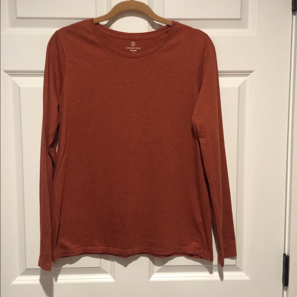 2 Lands end long sleeve tops. One is a small and the other is an xsmall.